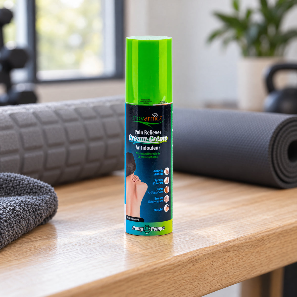 Novarnica pain relief cream 118 ml on a bench in a home gym recovery area with a foam roller