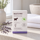 Pure vegetal base soap with fresh goat milk, Lavender Oil 141g – Nature by Canus, on a limestone bathroom ledge